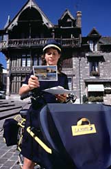 Postal carrier on bicycle